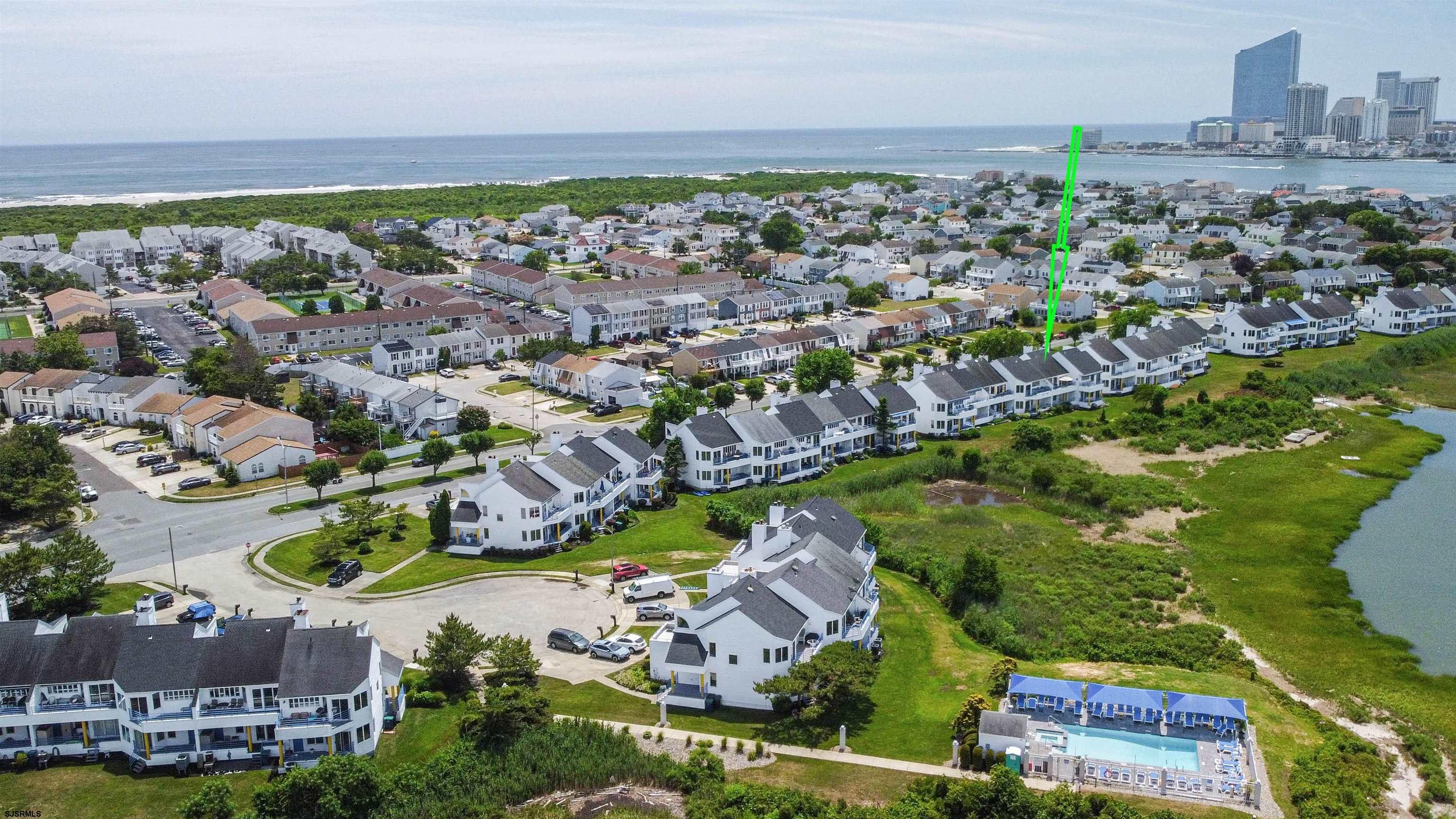 525 Lagoon Boulevard Brigantine, NJ 08203 - Photo 3 of 52 an aerial view of residential houses with outdoor space and swimming pool