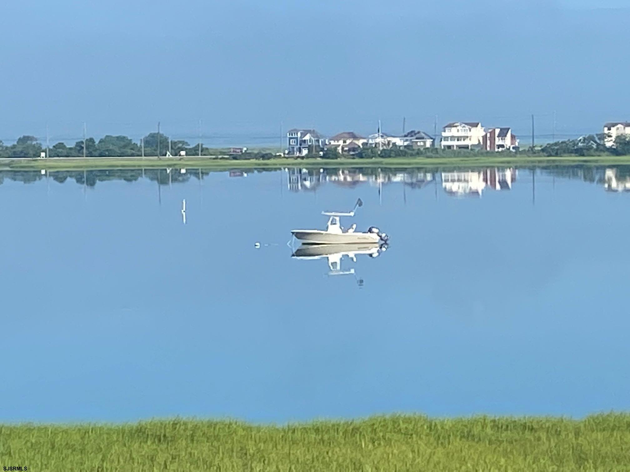 525 Lagoon Boulevard Brigantine, NJ 08203 - Photo 49 of 52 a view of a city with lake view and houses in the back
