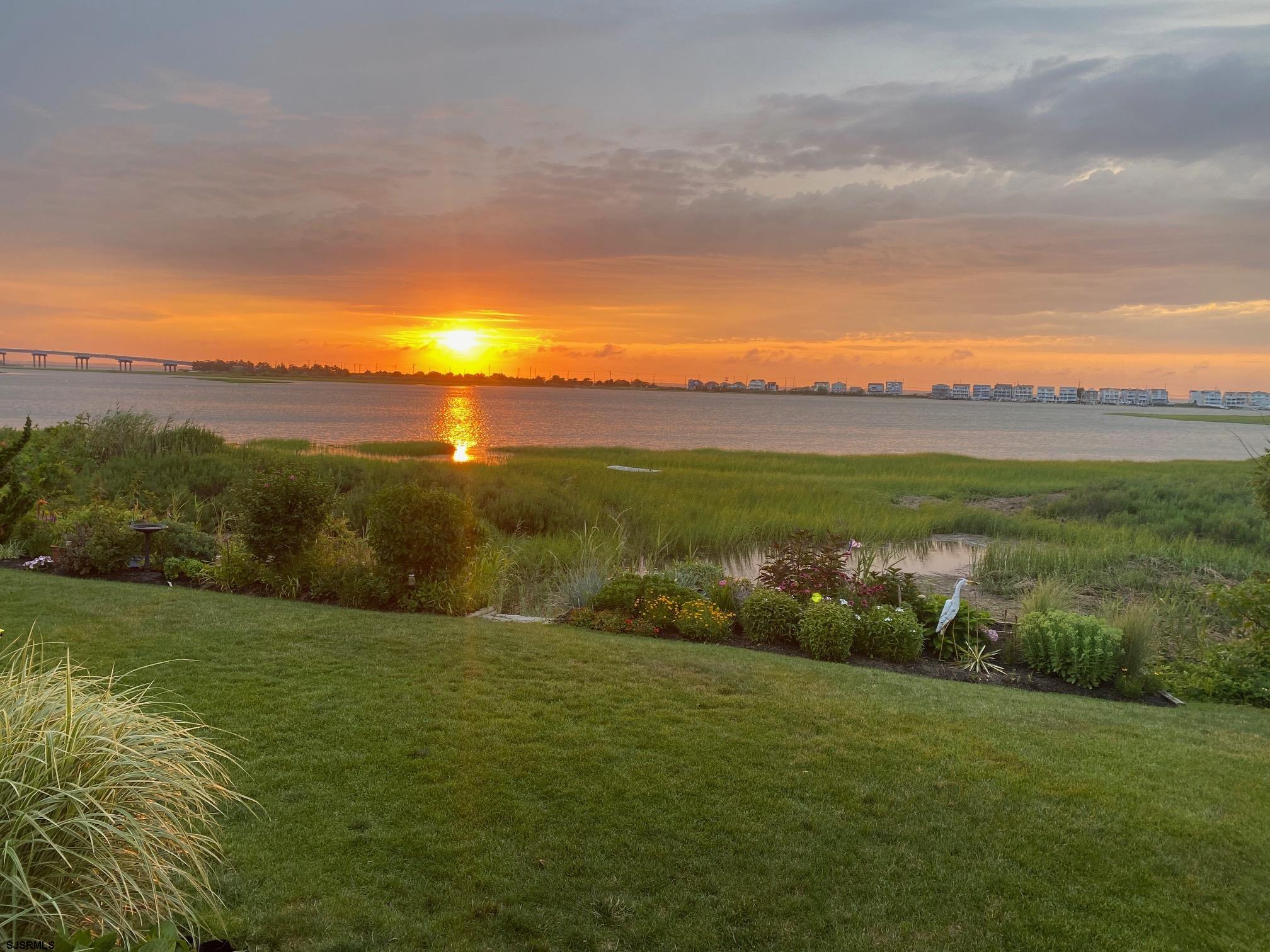 525 Lagoon Boulevard Brigantine, NJ 08203 - Photo 52 of 52 a view of an ocean and a yard