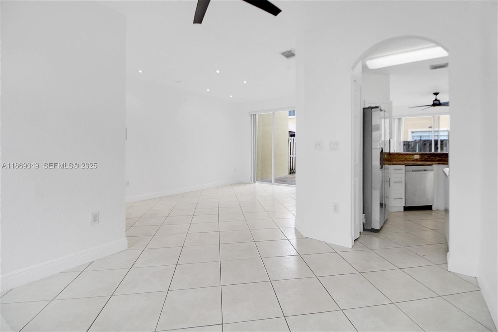 11724 Southwest 137th Path Miami, FL 33186 - Photo 11 of 33 a view of a kitchen with a sink and refrigerator