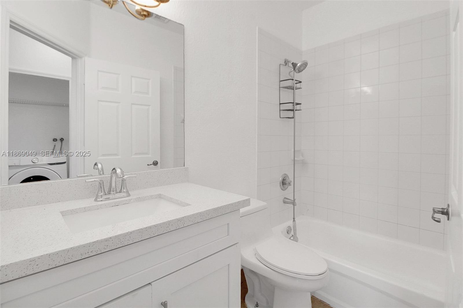 11724 Southwest 137th Path Miami, FL 33186 - Photo 23 of 33 a bathroom with a sink a toilet and shower