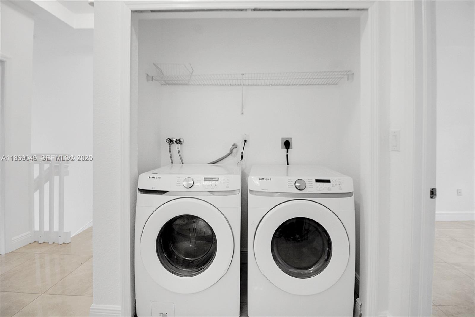 11724 Southwest 137th Path Miami, FL 33186 - Photo 24 of 33 a utility room with dryer and washer