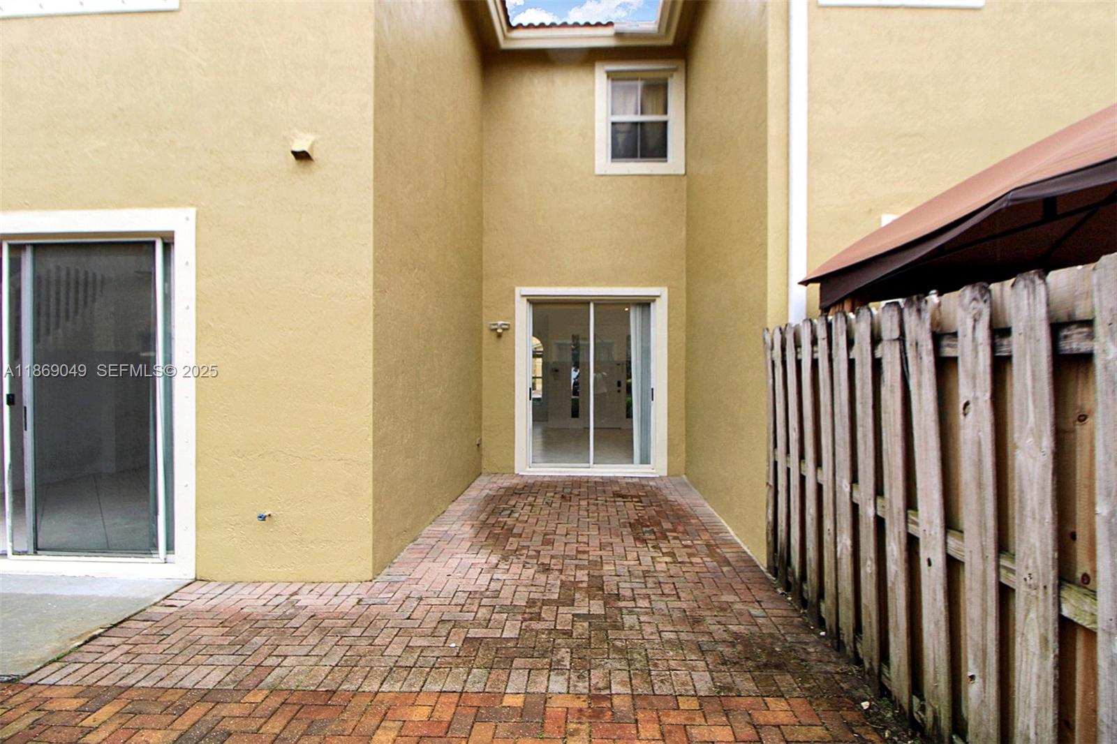 11724 Southwest 137th Path Miami, FL 33186 - Photo 30 of 33 a view of a house with a backyard