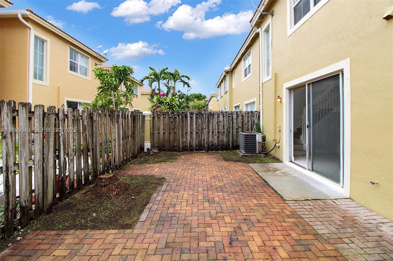 11724 Southwest 137th Path Miami, FL 33186 - Photo 31 of 33 a view of a house with a backyard