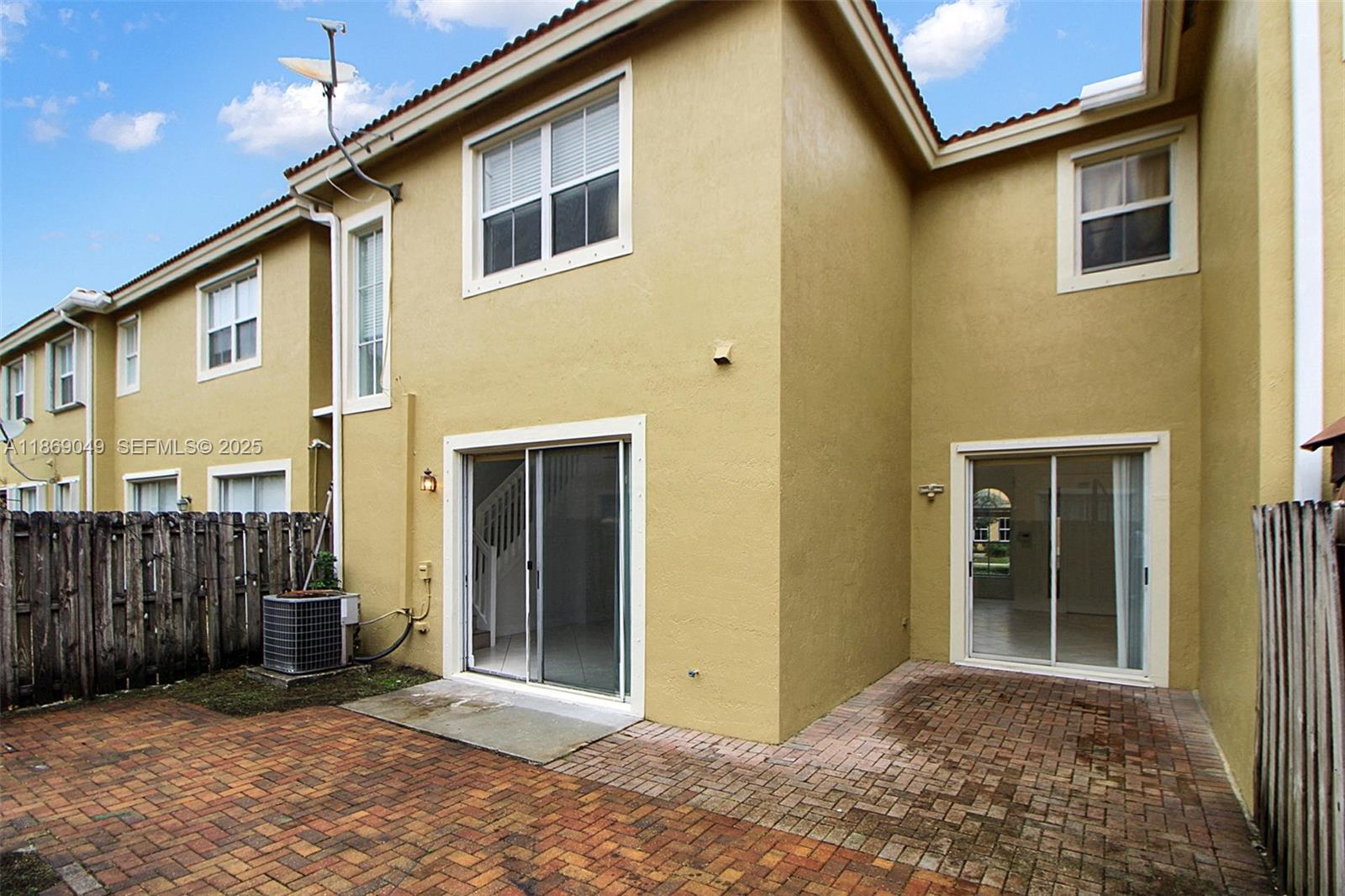 11724 Southwest 137th Path Miami, FL 33186 - Photo 32 of 33 a front view of a house with a garage