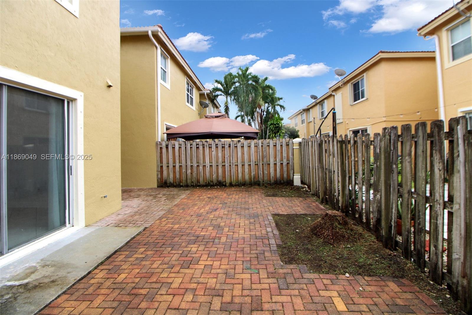 11724 Southwest 137th Path Miami, FL 33186 - Photo 33 of 33 a view of a pathway of a building
