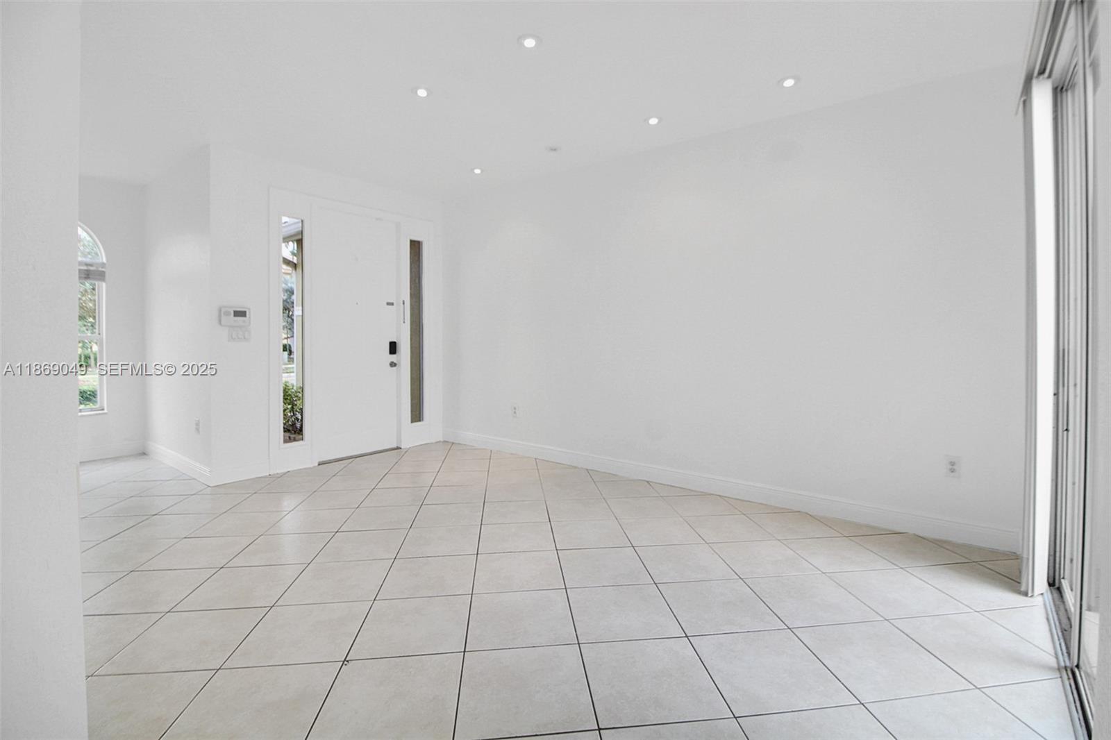 11724 Southwest 137th Path Miami, FL 33186 - Photo 5 of 33 a view of an empty room