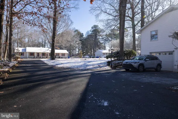 a car parked in front of a house
