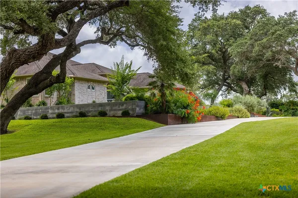 a view of a backyard with a garden