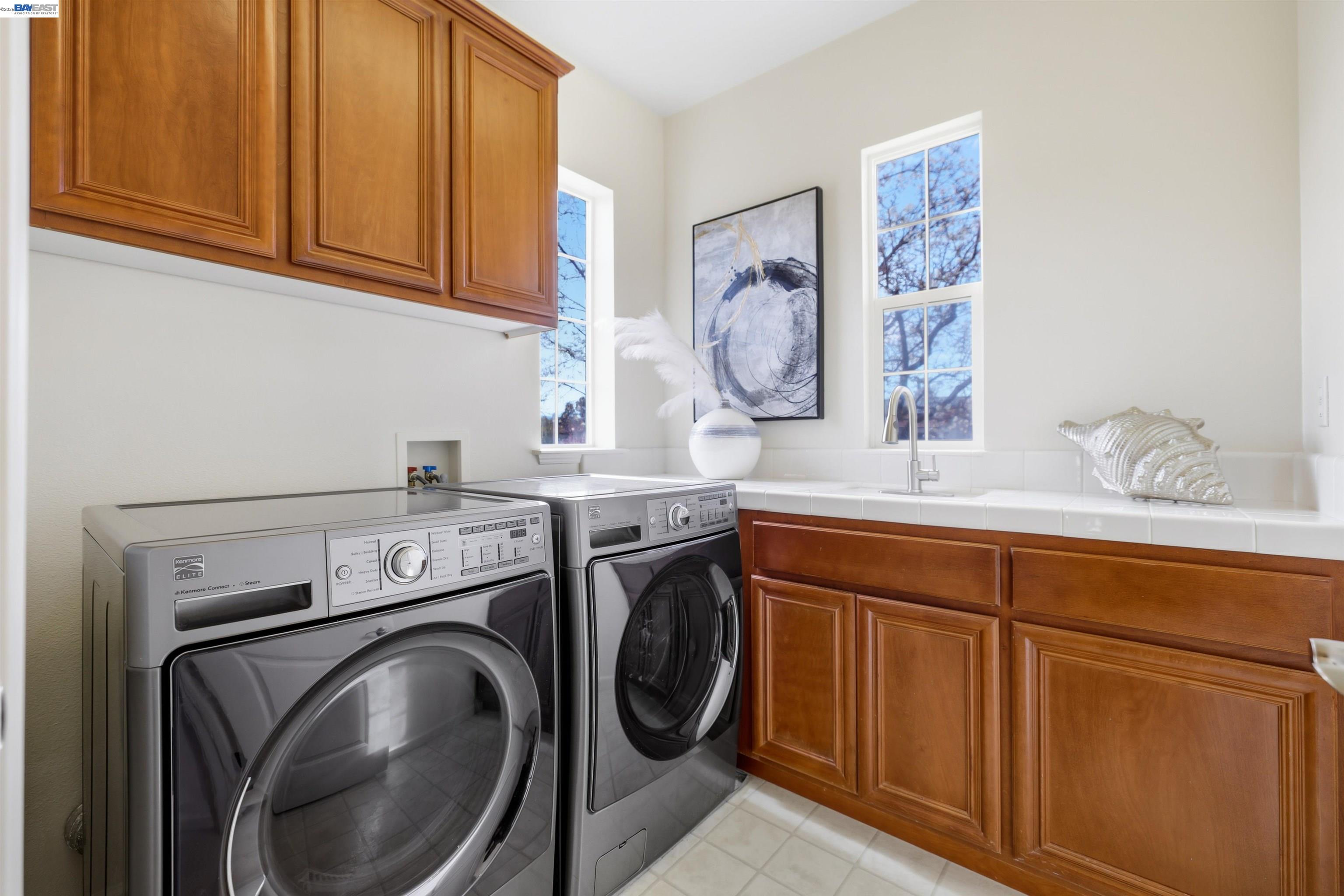 112 Begonia Court San Ramon, CA 94582 - Photo 30 of 52 a utility room with sink dryer and washer