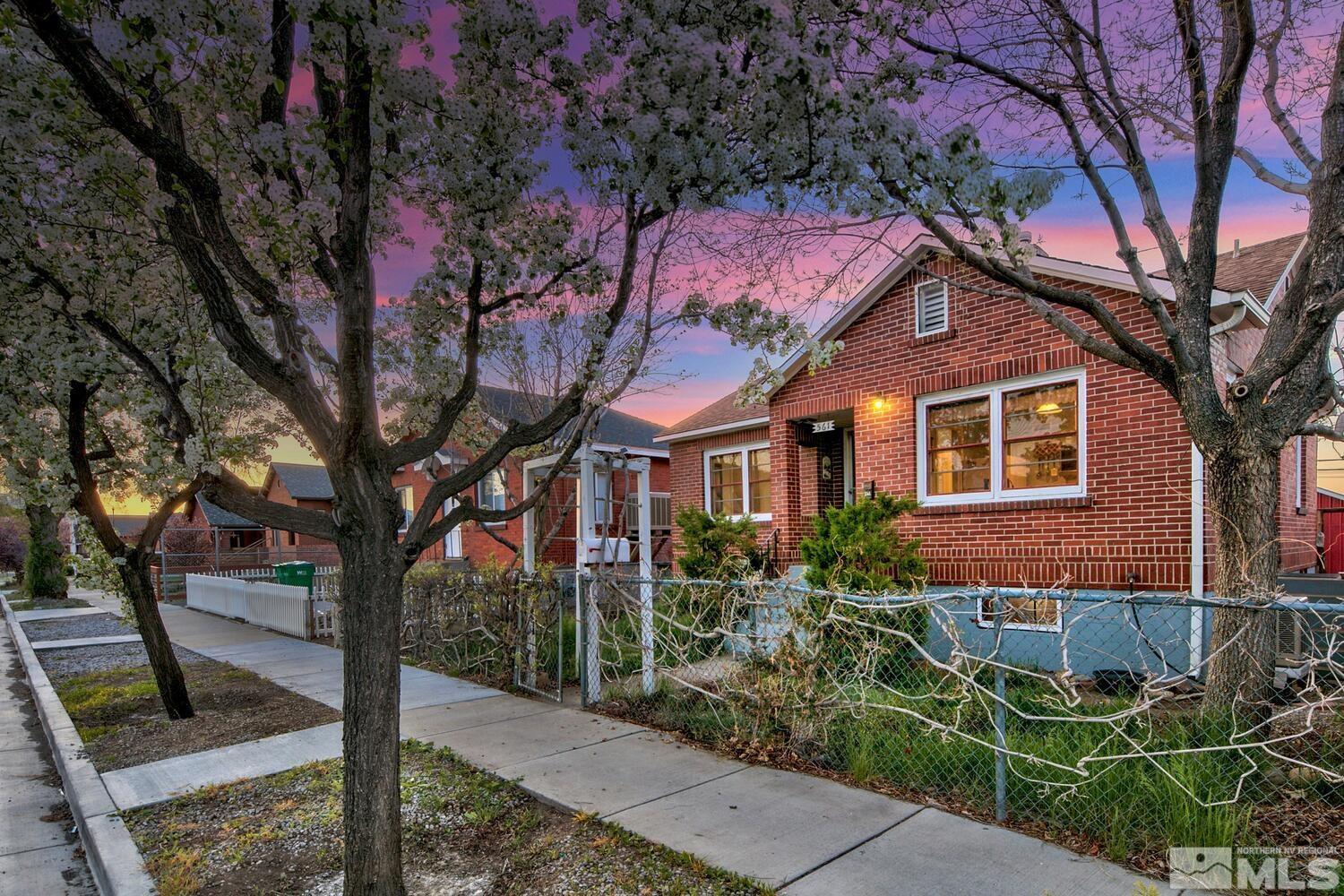 561 Moran Street Reno, NV 89502 - Photo 1 of 40 a front view of a house with garden