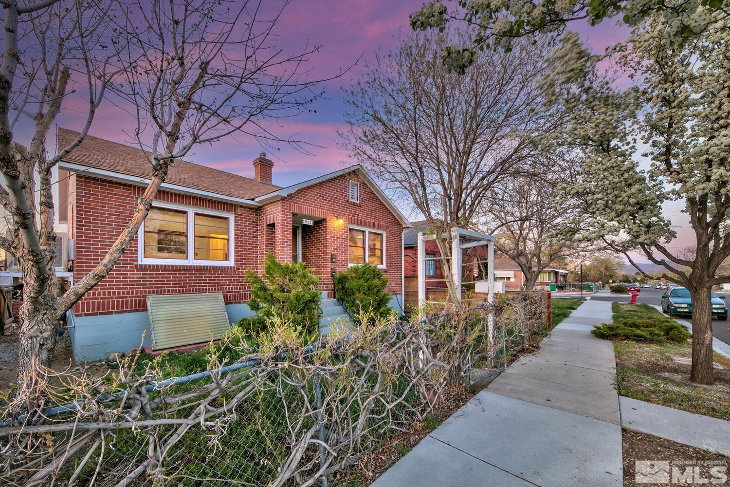 561 Moran Street Reno, NV 89502 - Photo 39 of 40 a front view of a house with trees and plants