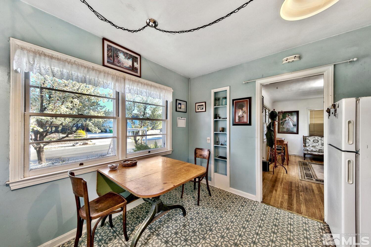 561 Moran Street Reno, NV 89502 - Photo 7 of 40 a view of a dining room with furniture window and wooden floor