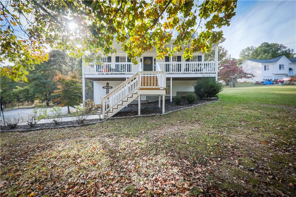 front view of a house with a yard