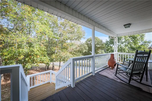 a view of a two chairs in balcony