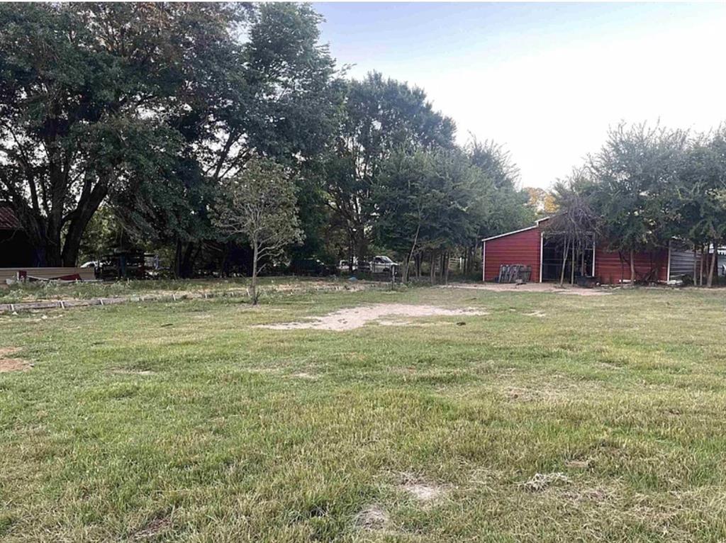 8261 County Road 381 Tyler, TX 75708 - Photo 12 of 40 a view of an outdoor space and yard