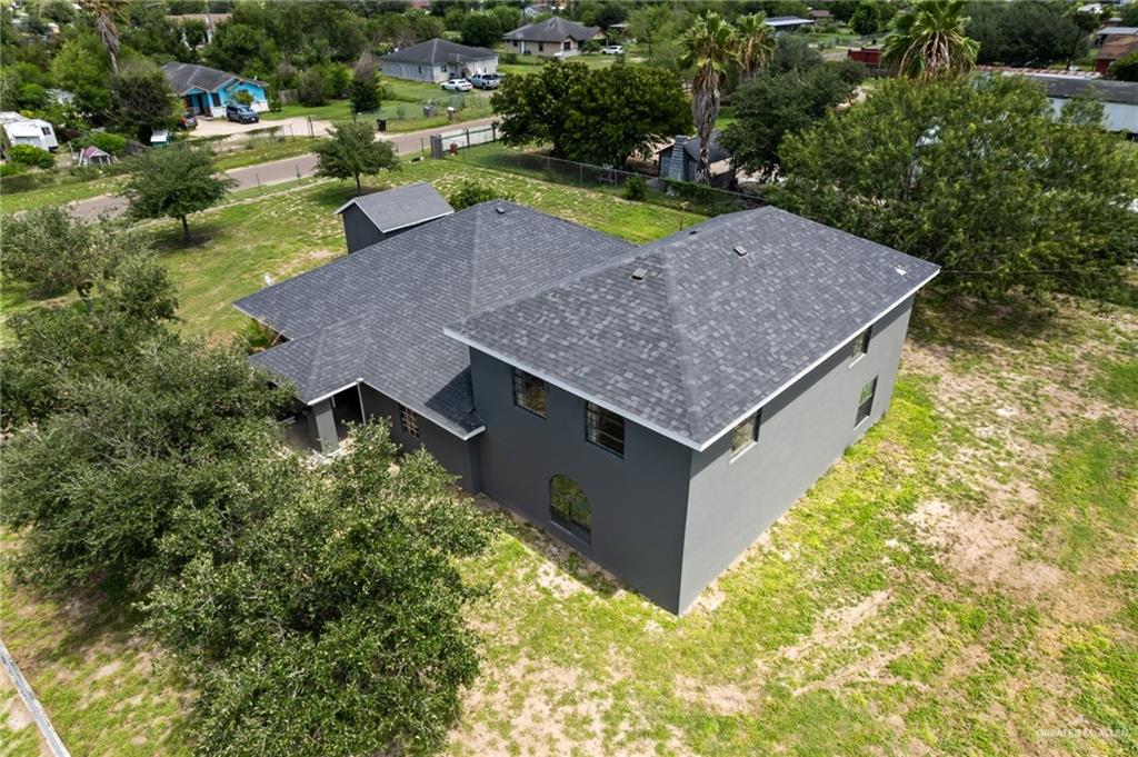 8006 Senecio Street Mission, TX 78574 - Photo 18 of 20 an aerial view of residential house with outdoor space and swimming pool
