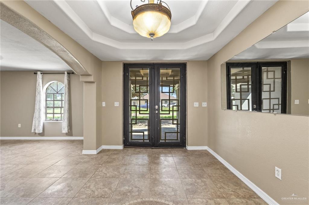 8006 Senecio Street Mission, TX 78574 - Photo 2 of 20 an empty room with closet and windows