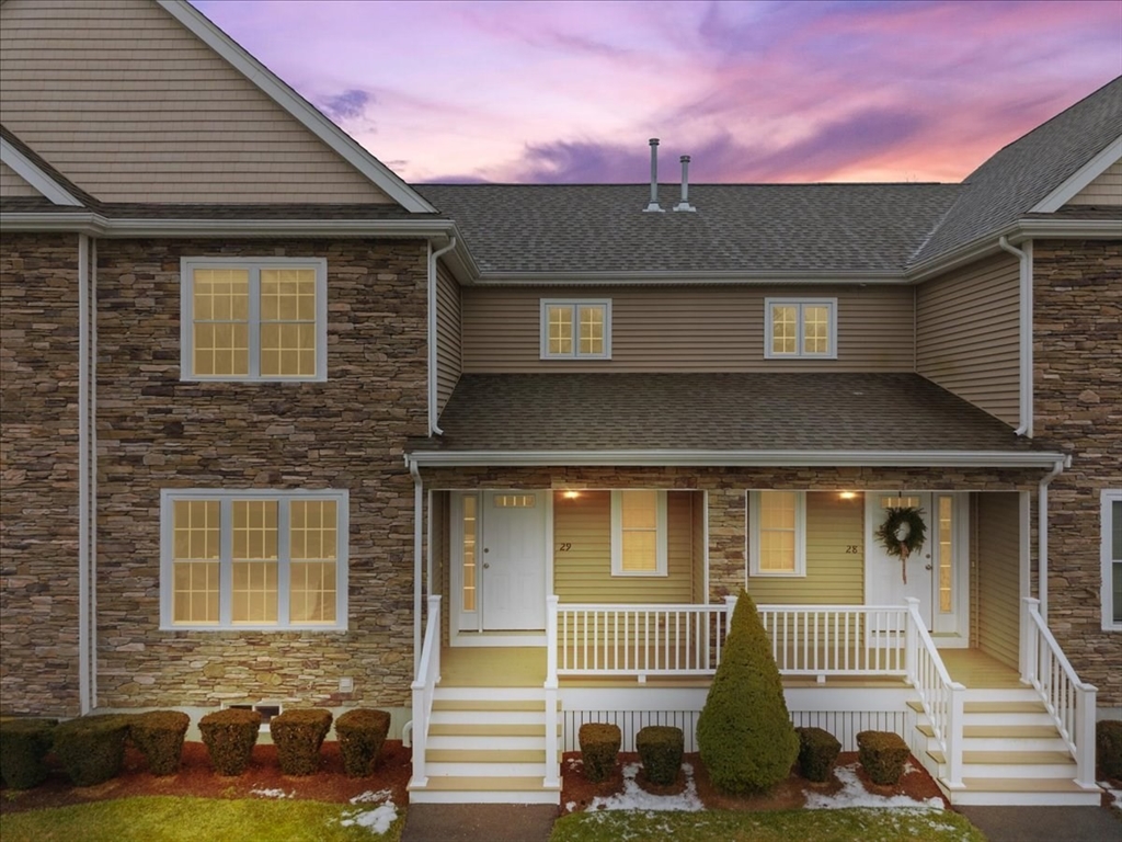 22 Highland Road, Unit 29 Raynham, MA 02767 - Photo 1 of 36 a front view of a house