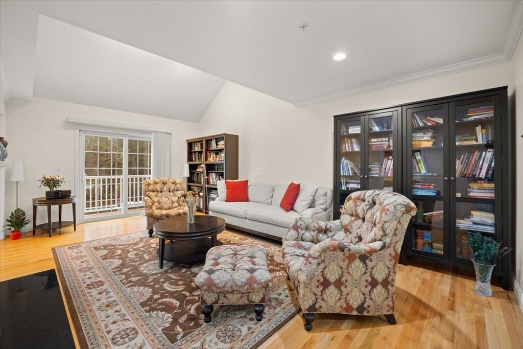 22 Highland Road, Unit 29 Raynham, MA 02767 - Photo 10 of 36 a living room with furniture and a large window
