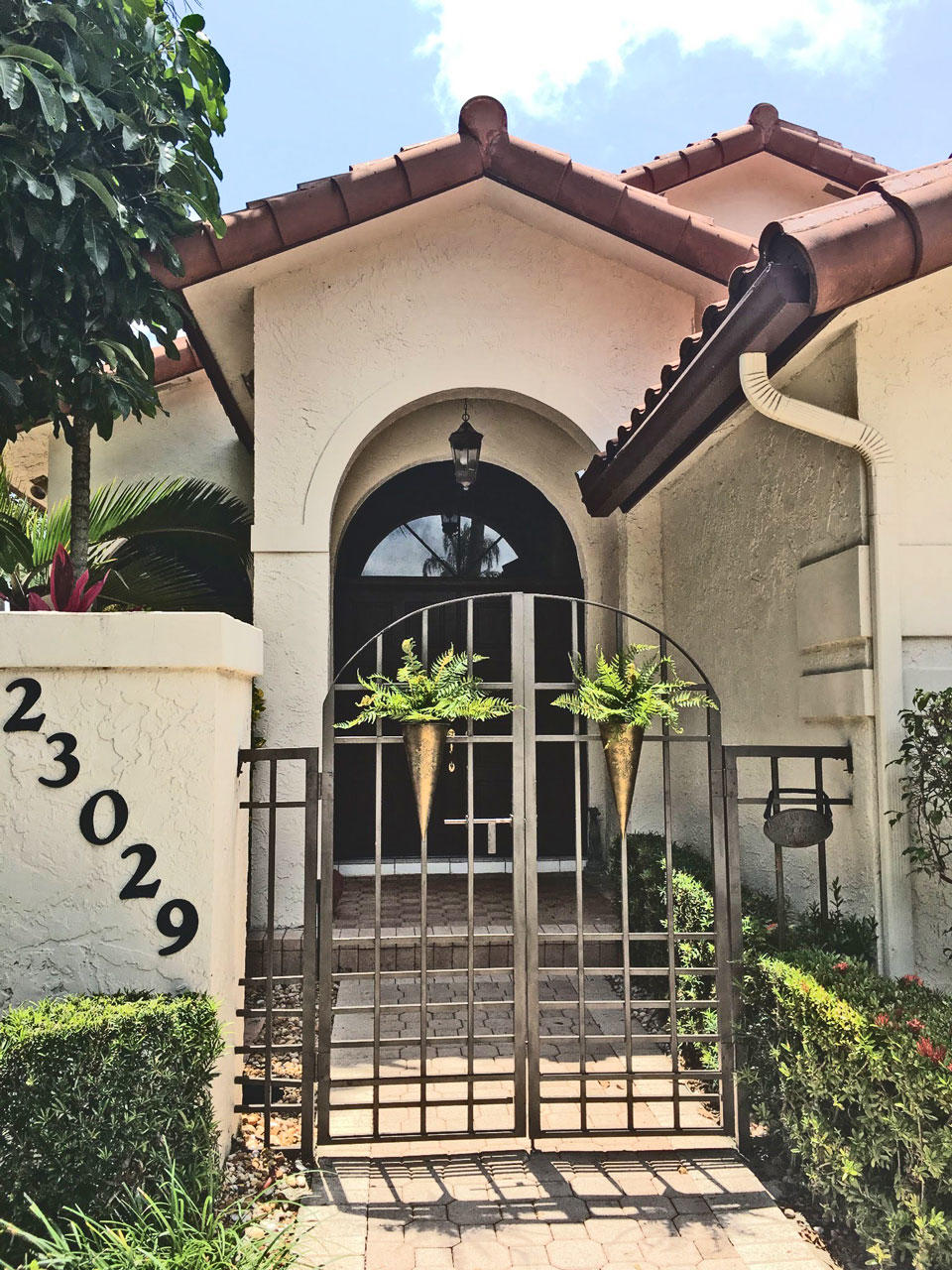 23029 Via Stel Boca Raton, FL 33433 - Photo 1 of 18 christine-door2
