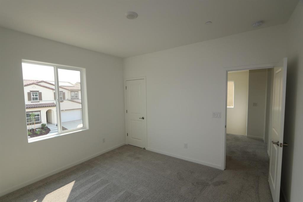 3433 Cantor Drive Folsom, CA 95630 - Photo 5 of 18 an empty room with windows and closet