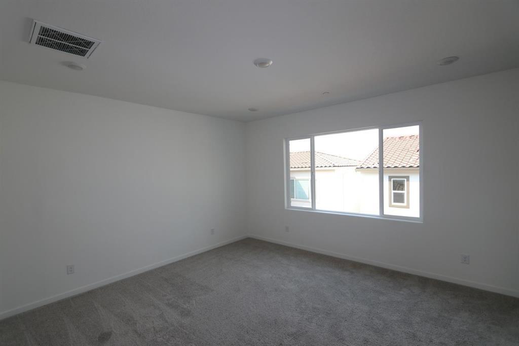 3433 Cantor Drive Folsom, CA 95630 - Photo 10 of 18 an empty room with a window