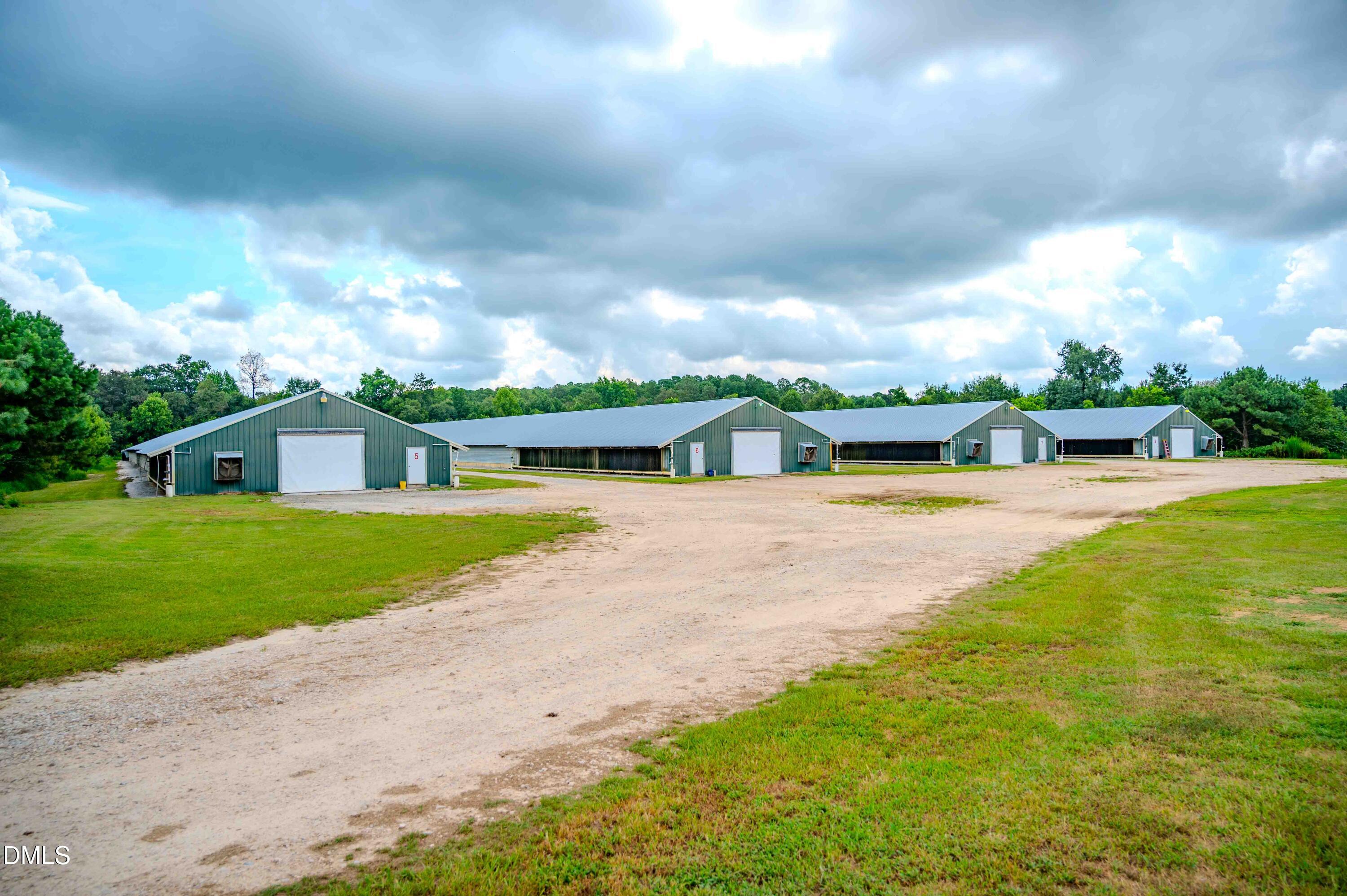 687 Brock Road Bunnlevel, NC 28323 - Photo 11 of 68 a front view of a house with garden