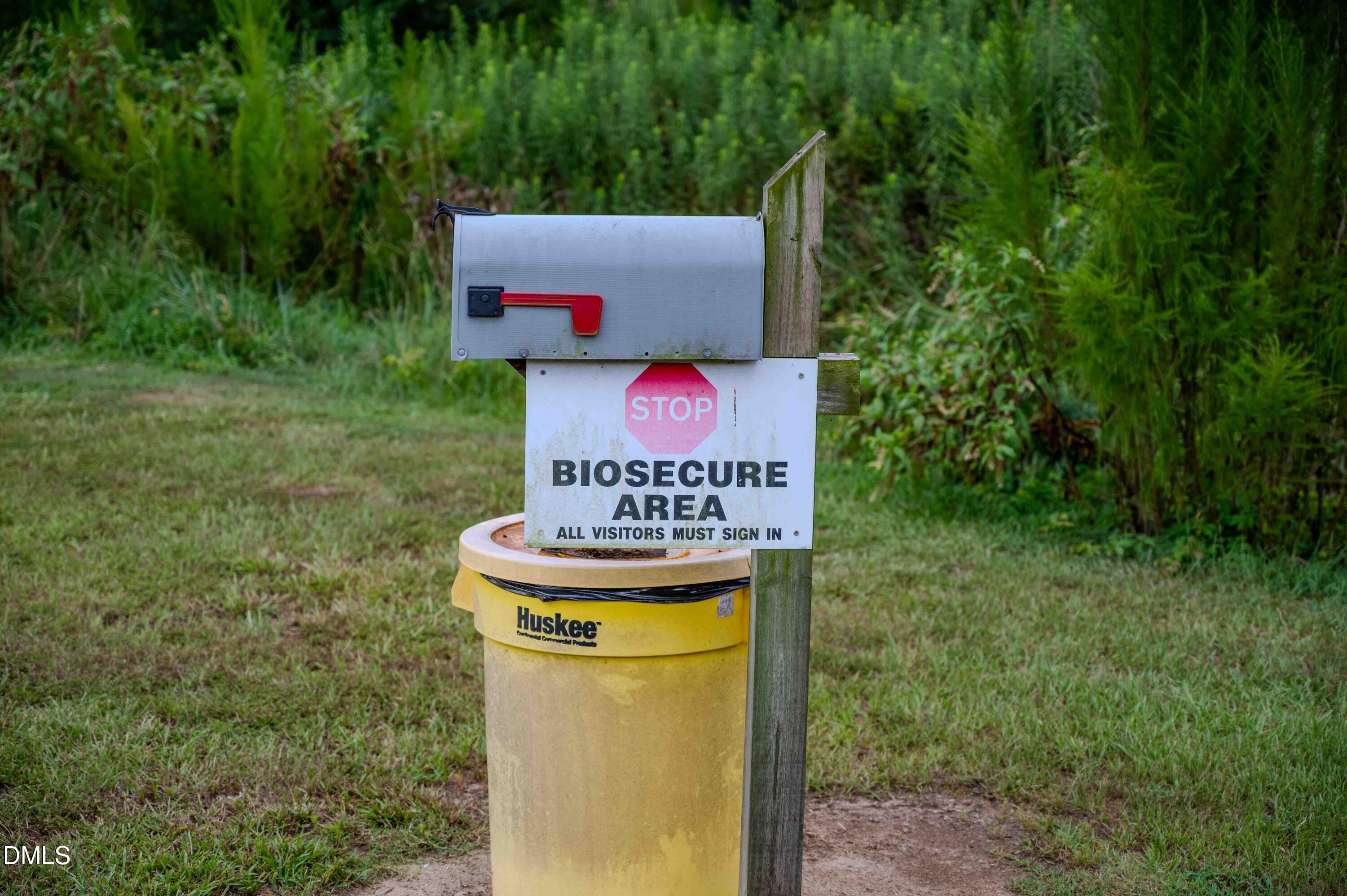 687 Brock Road Bunnlevel, NC 28323 - Photo 9 of 68 a view of a sign in a yard with green space