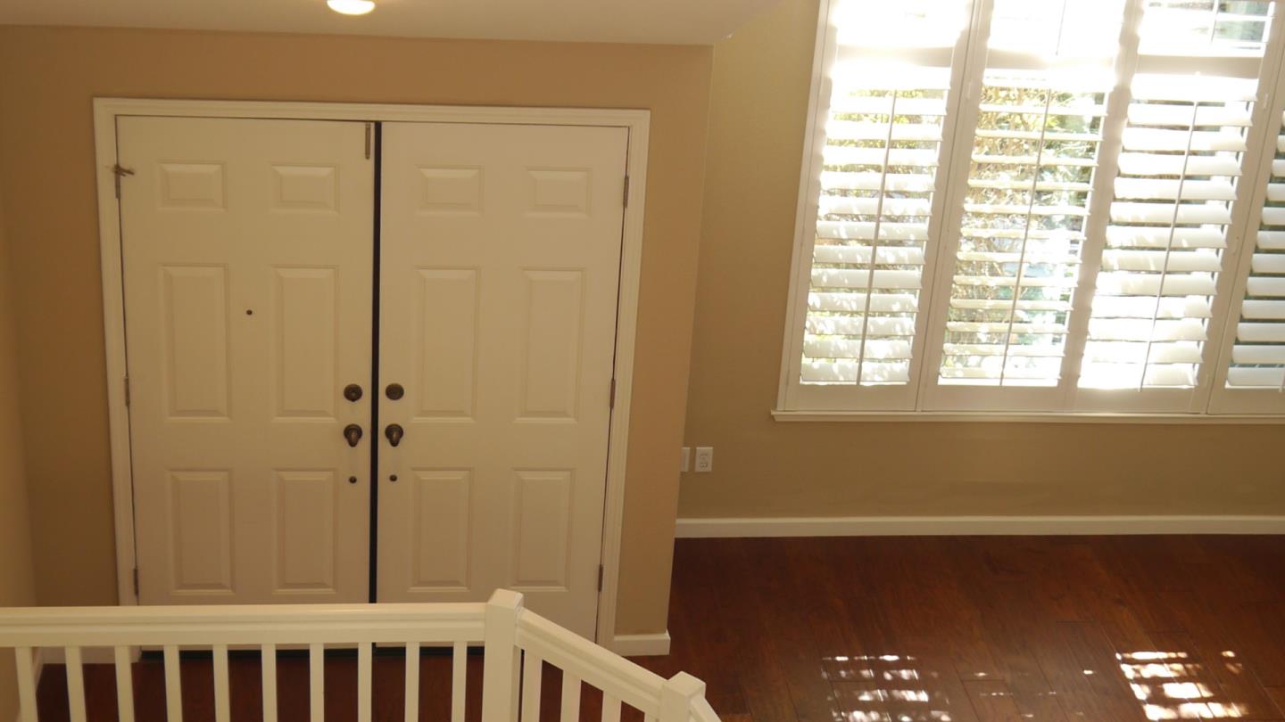 4592 Fallstone Court San Jose, CA 95124 - Photo 9 of 13 a view of a small space with wooden floor and a window