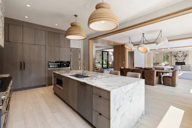 a kitchen with a stove and a microwave