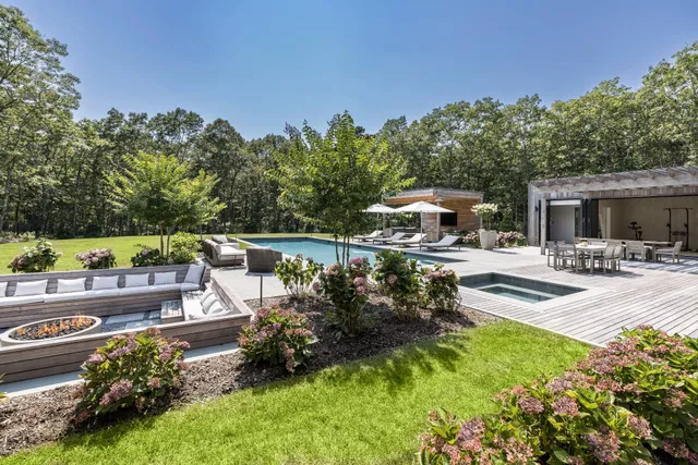 a view of a swimming pool with a patio