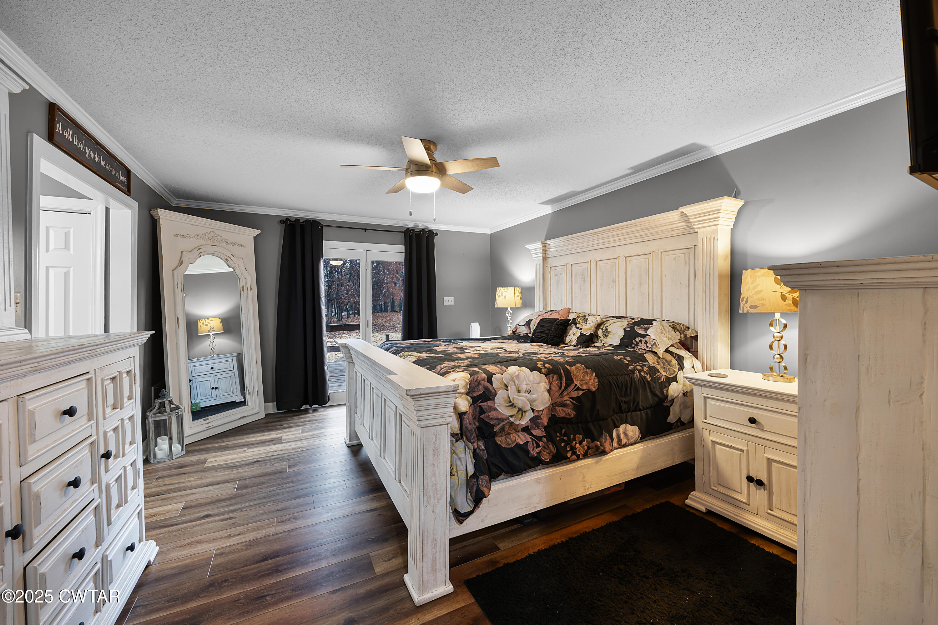 185 Bascom Road Jackson, TN 38305 - Photo 13 of 28 a spacious bedroom with a bed a dresser and a window