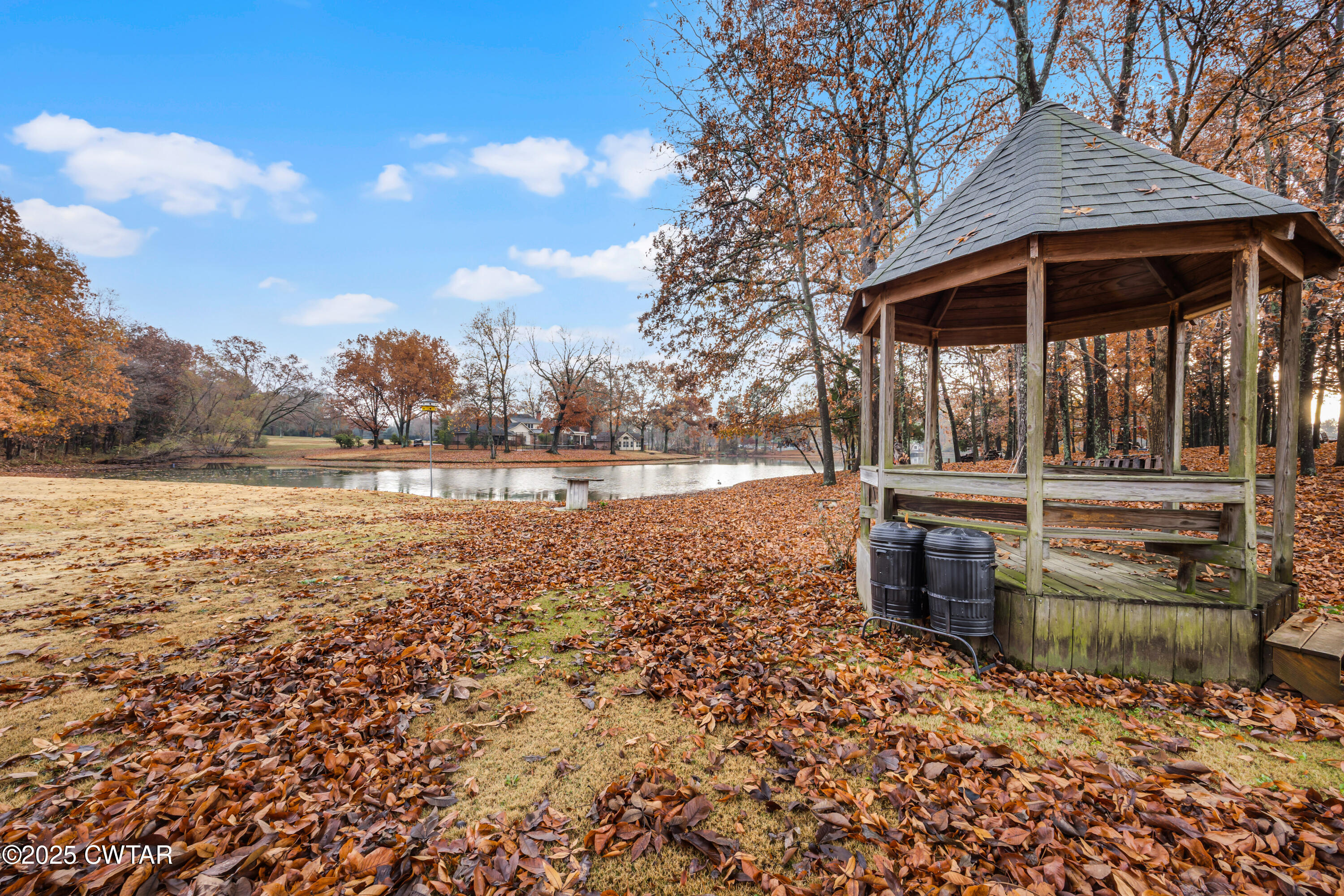 185 Bascom Road Jackson, TN 38305 - Photo 28 of 28 a backyard of a house with lots of green space