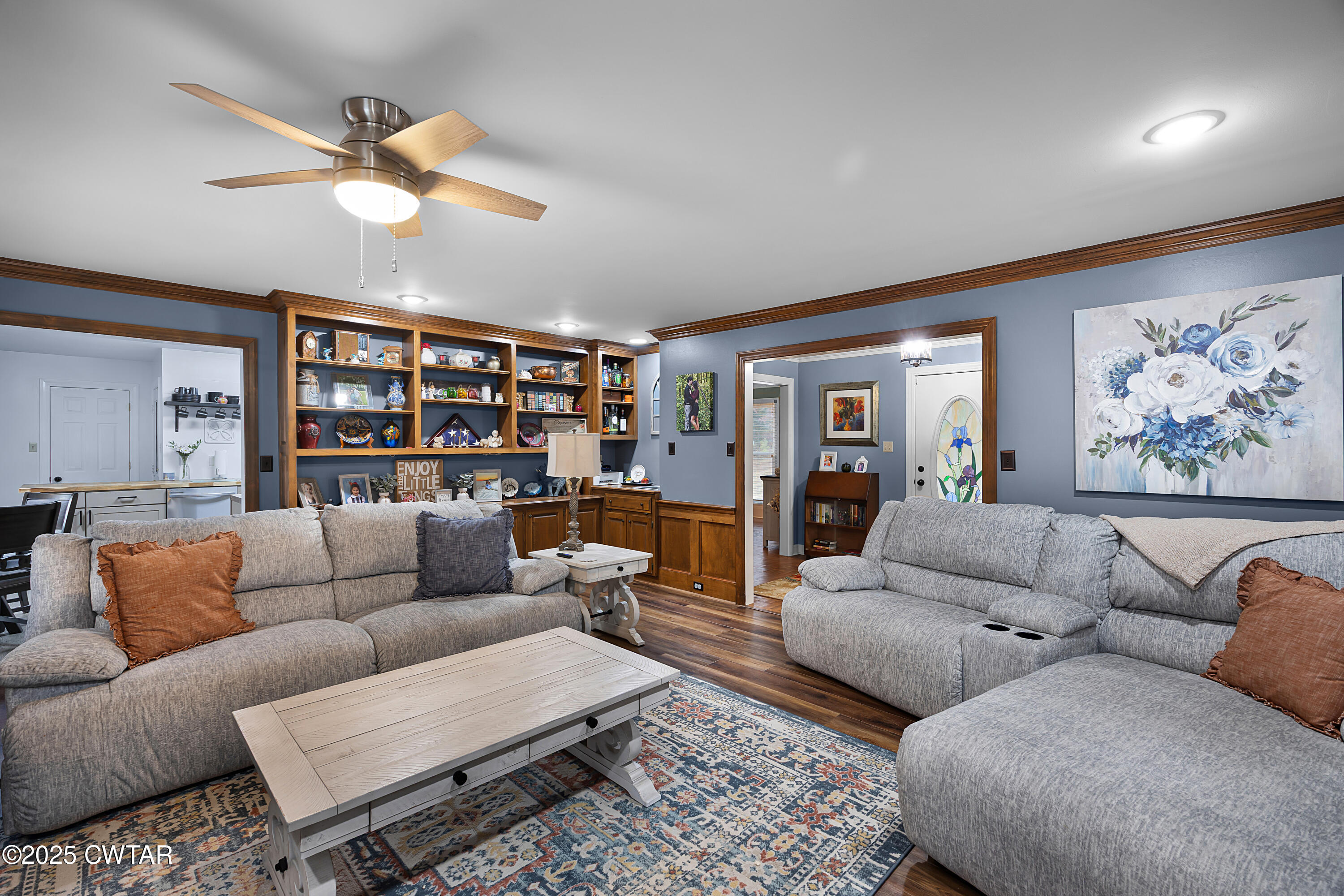 185 Bascom Road Jackson, TN 38305 - Photo 4 of 28 a living room with furniture and wooden floor