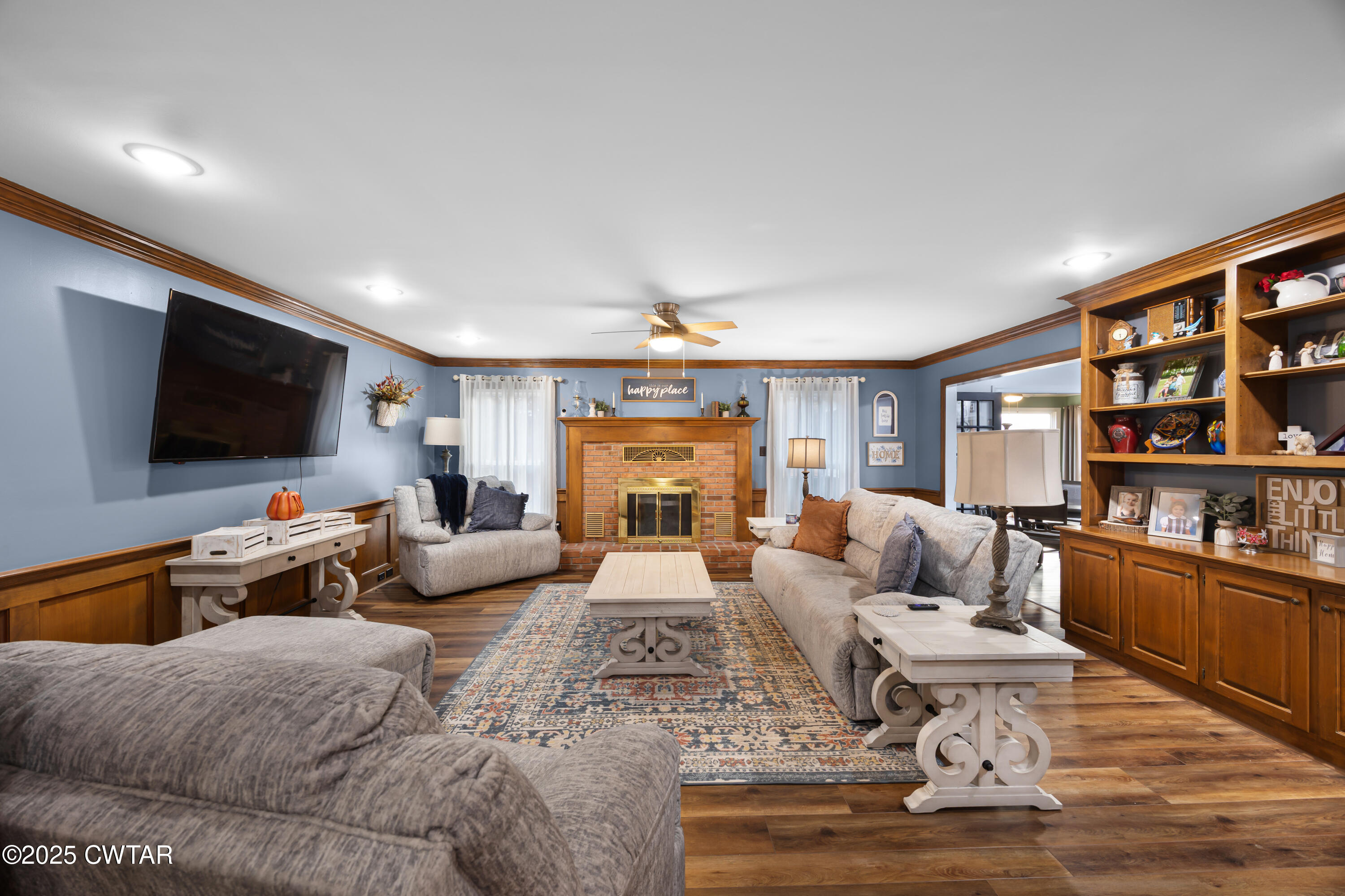 185 Bascom Road Jackson, TN 38305 - Photo 5 of 28 a living room with furniture and a flat screen tv