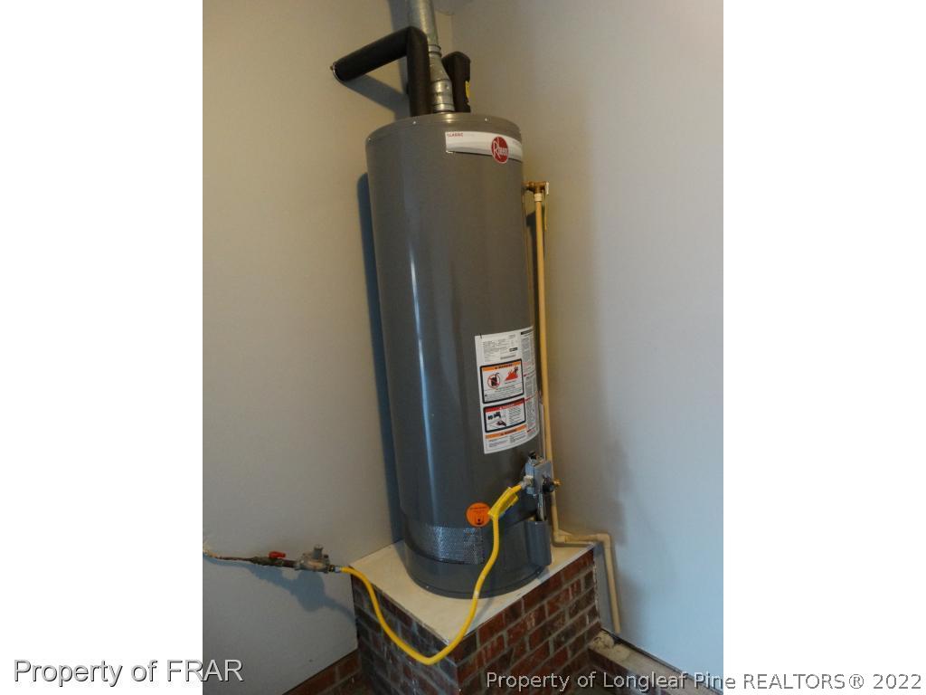 532 Old Farm Road Fayetteville, NC 28314 - Photo 9 of 36 a room with storage and utility