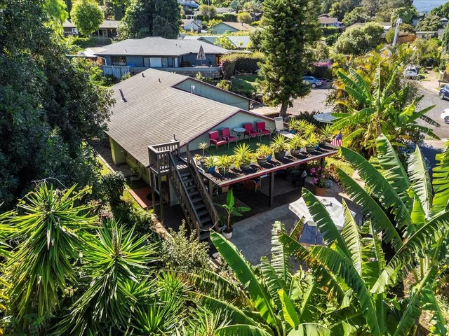 a view of a city with mountains in the background