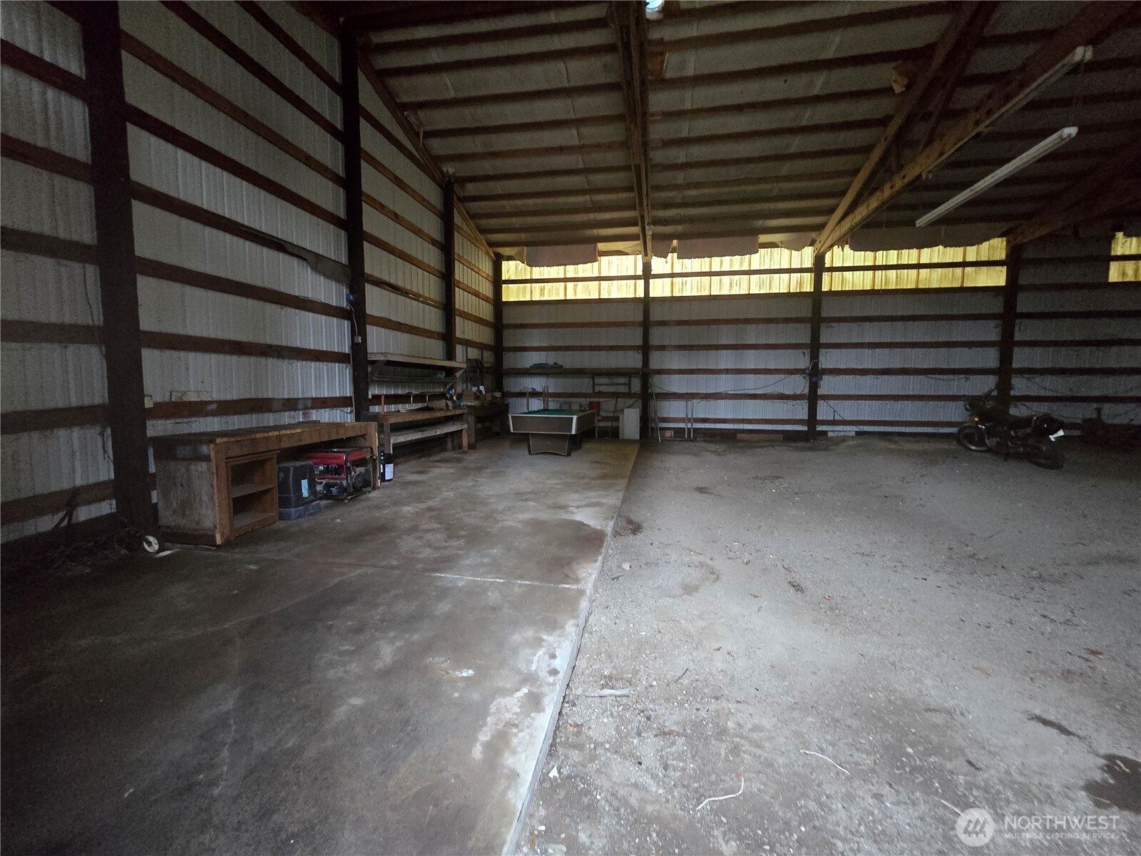 600 Russell Road Forks, WA 98331 - Photo 23 of 31 a view of empty room with wooden ceiling