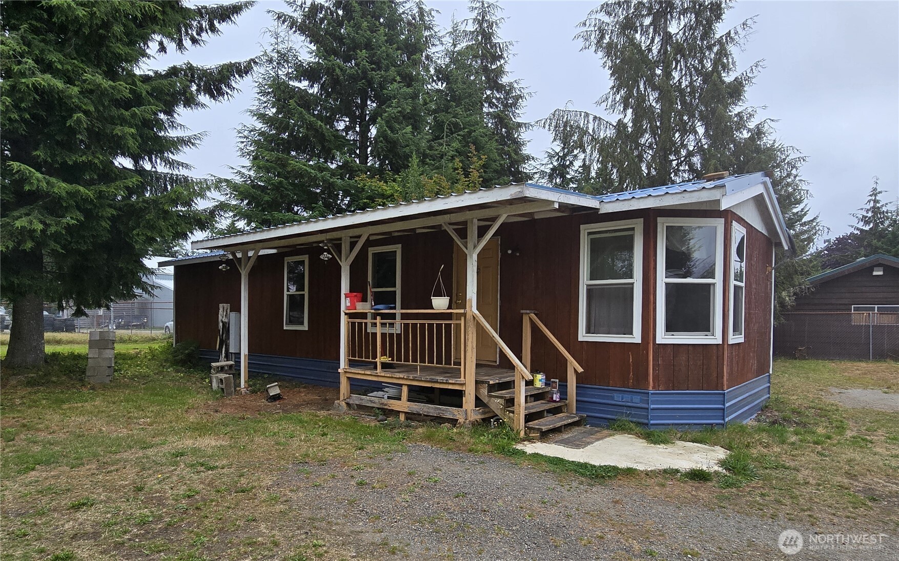 600 Russell Road Forks, WA 98331 - Photo 26 of 31 a view of house with a yard and roof