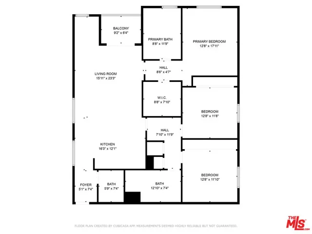 a picture of a bench in front of a wall