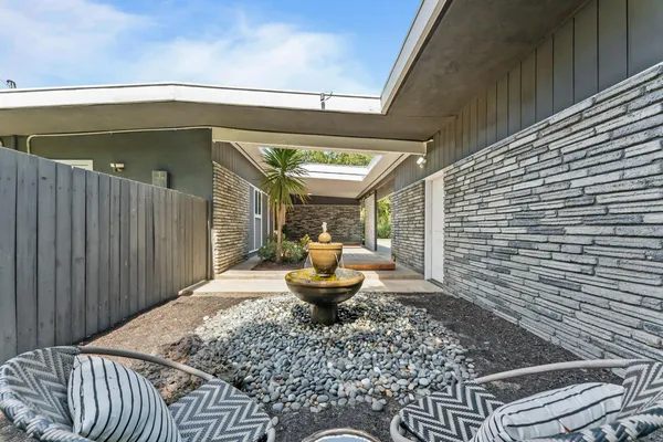 a front view of a house with patio