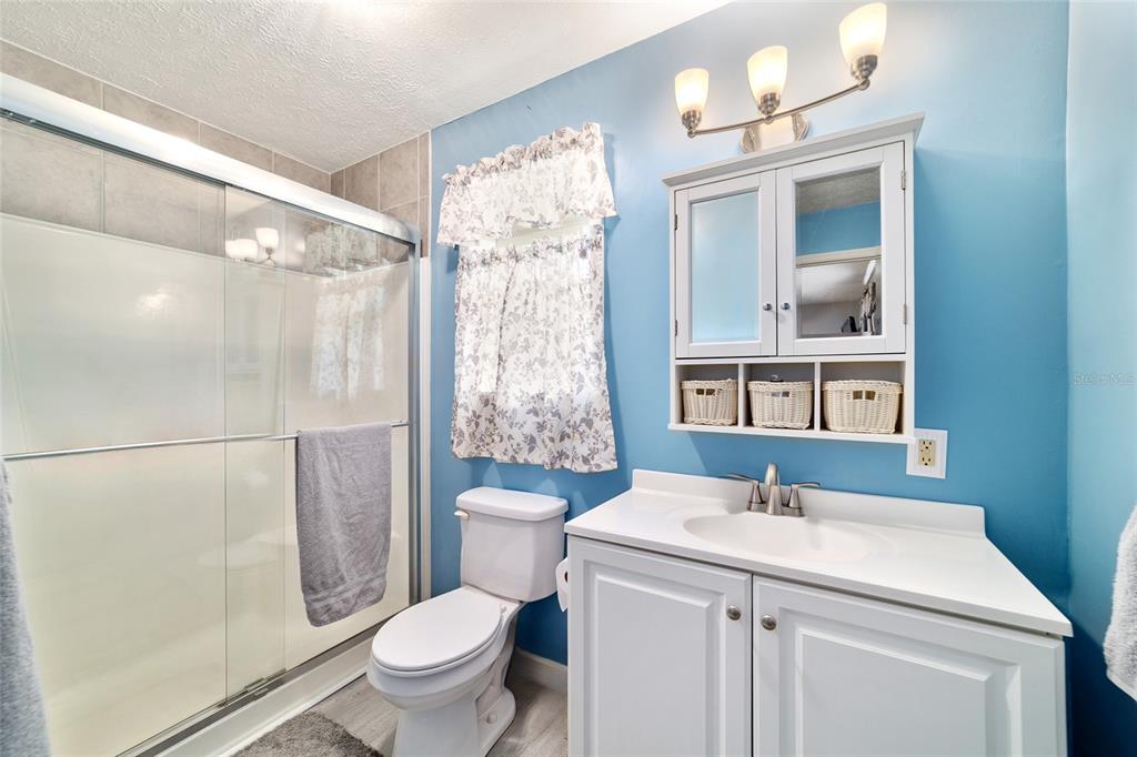 15755 Southwest 90th Avenue Dunnellon, FL 34432 - Photo 31 of 55 a bathroom with a sink toilet and shower