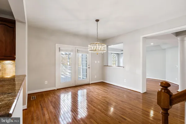 a view of an empty room with a bathroom