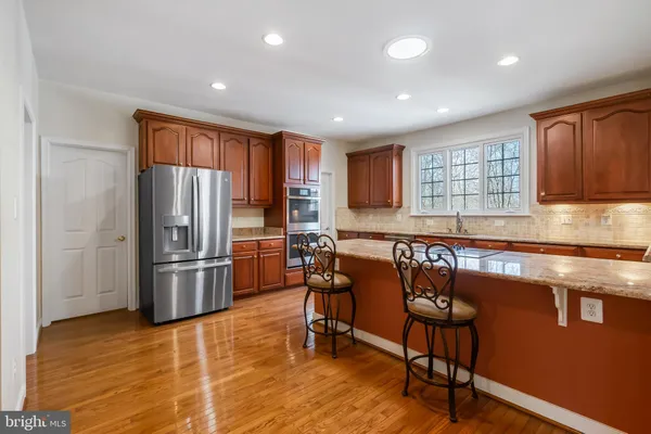 a bathroom with a shower a toilet and a sink