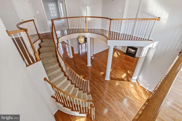 a kitchen with stainless steel appliances granite countertop a sink and a stove
