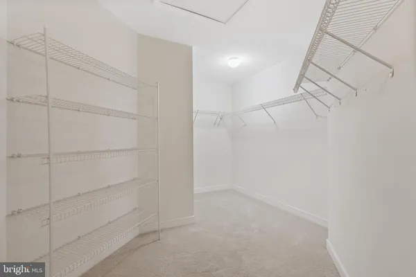 a swimming pool with outdoor seating and yard