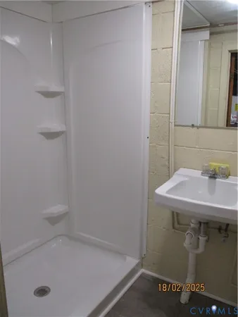 a bathroom with a sink and a tub