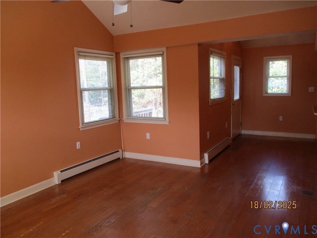 126 Beverly Road Ashland, VA 23005 - Photo 5 of 20 an empty room with wooden floor and windows