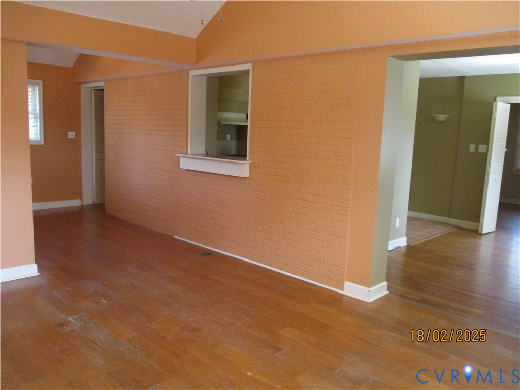 126 Beverly Road Ashland, VA 23005 - Photo 6 of 20 an empty room with wooden floor and closet